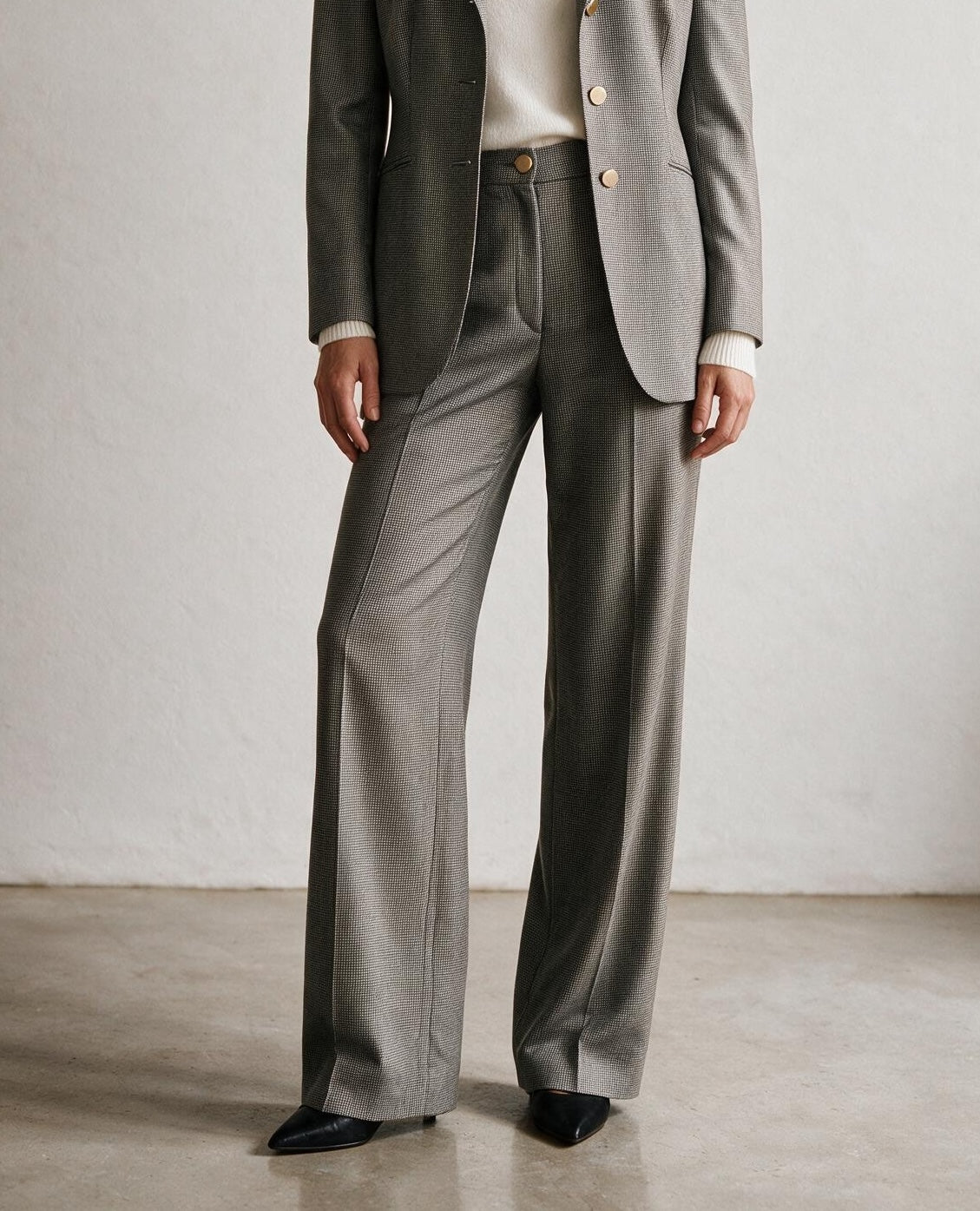 Women's brown puppytooth wool trousers by Holden & Hunt